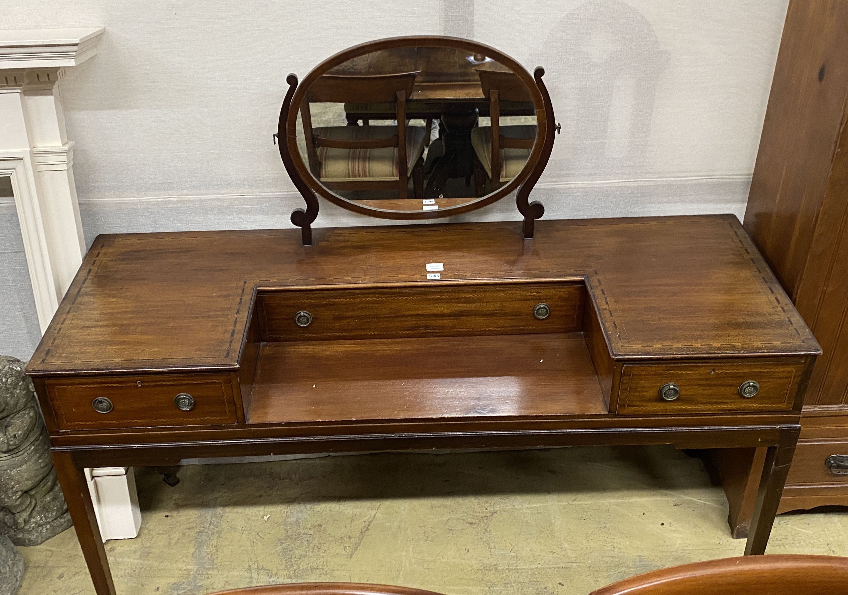 A mid 19th century mahogany dressing table,